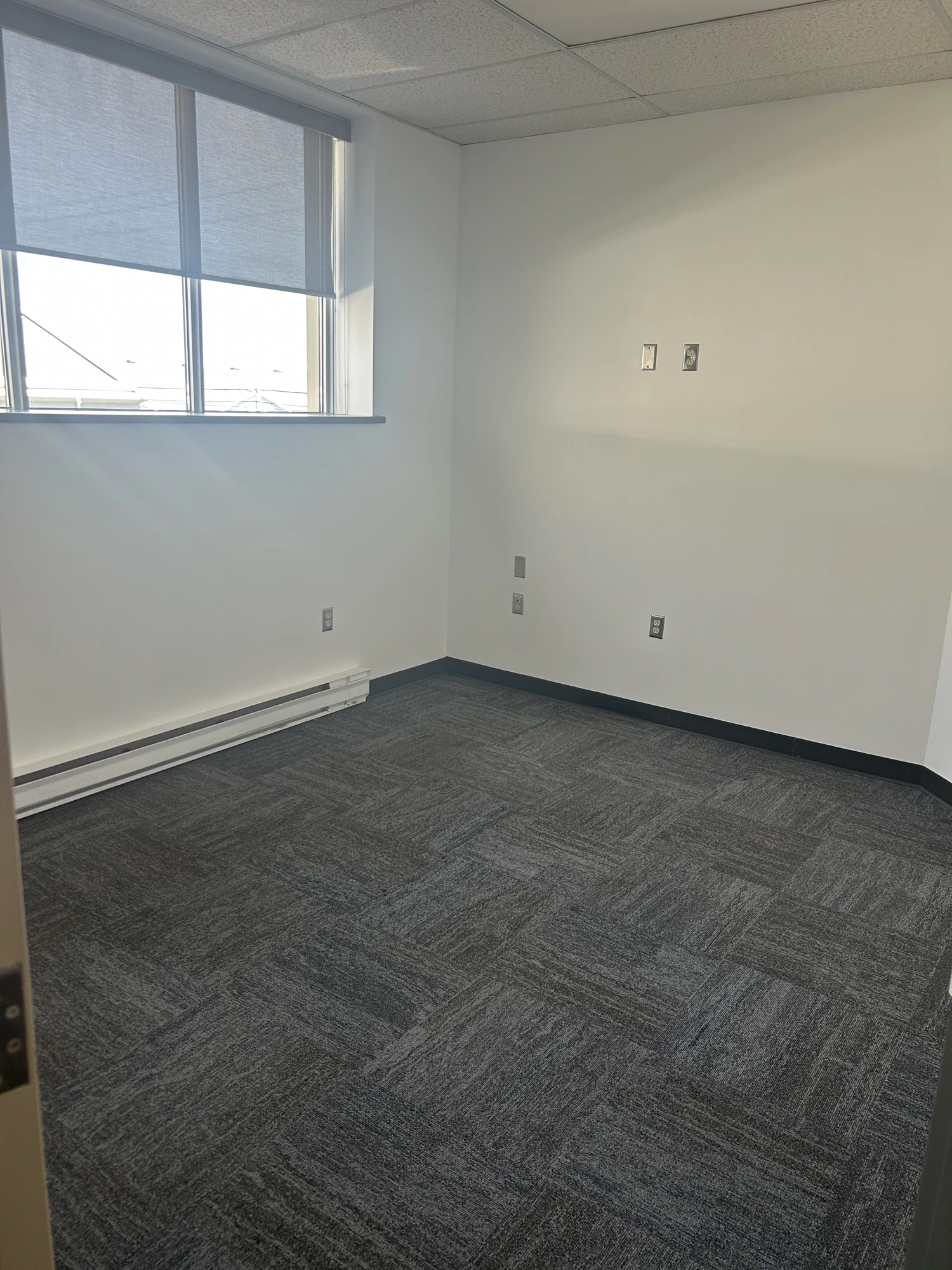 Suite 220 — corner office with two windows